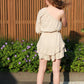 Korte playsuit met één mouw Yasmijn | Beige